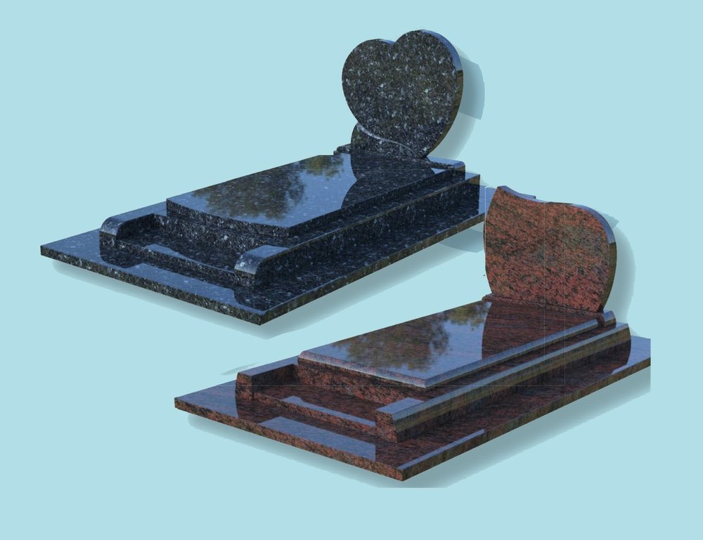 Deux monuments funéraires en granit d'exposition, l'un bleu à stèle en forme de cœur, l'autre rouge